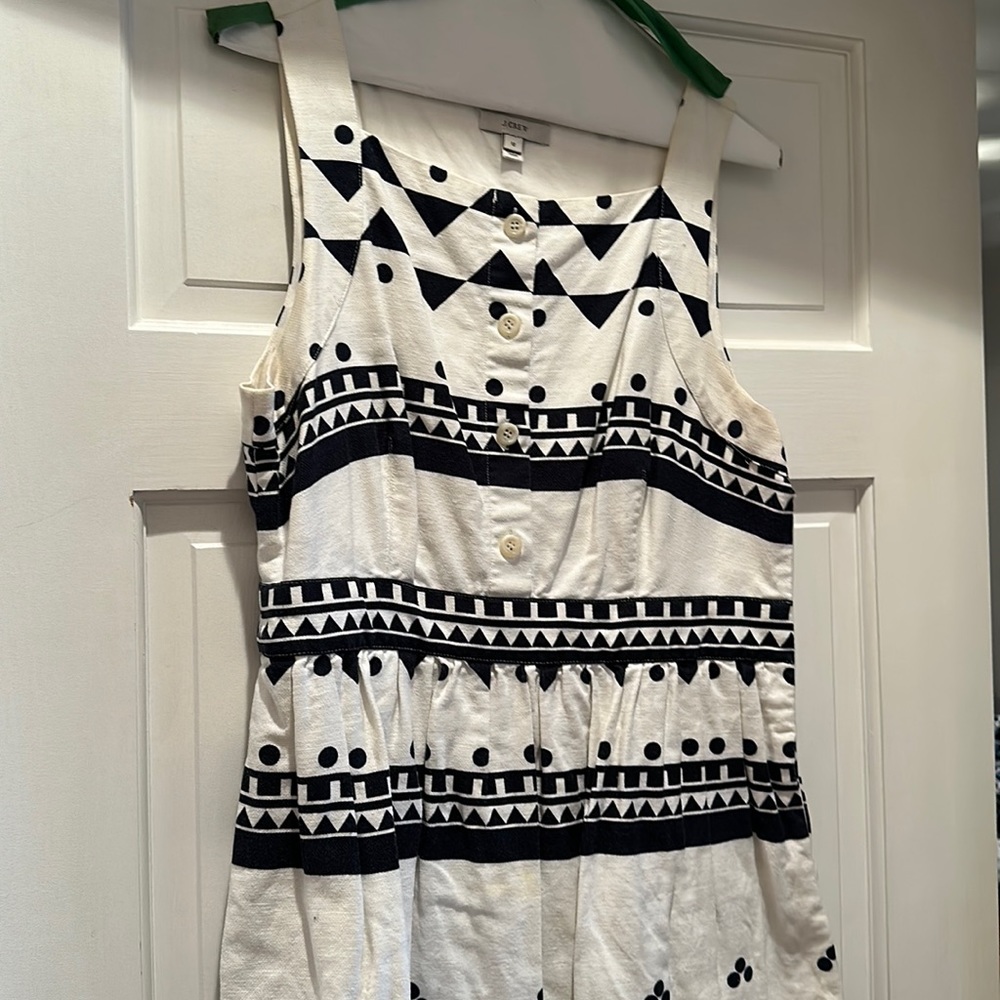 Like new, square neck fit and flare navy and cream dress with pockets.